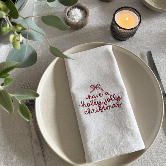 HOLLY JOLLY CHRISTMAS – Besticktes Leinen-Serviettenset, 4er-Set Weiß