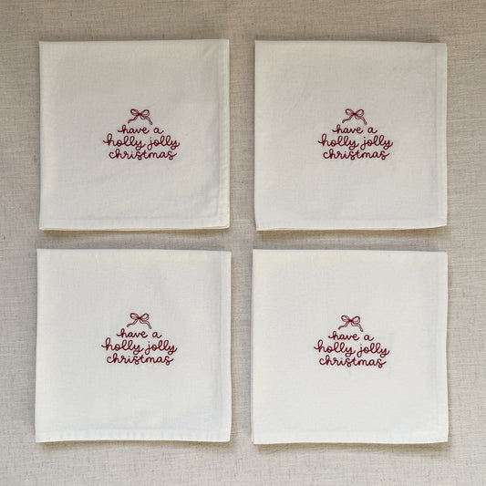 HOLLY JOLLY CHRISTMAS – Besticktes Leinen-Serviettenset, 4er-Set Weiß