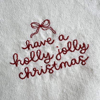 HOLLY JOLLY CHRISTMAS – Besticktes Leinen-Serviettenset, 4er-Set Weiß